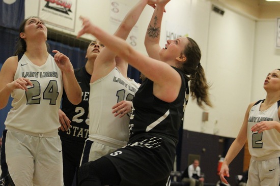 Mikayla fights for a rebound.