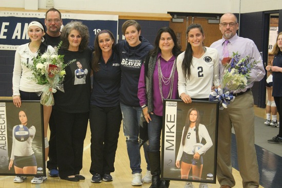 Alexis and Amanda celebrate Senior day with their family and former coach Bertges.